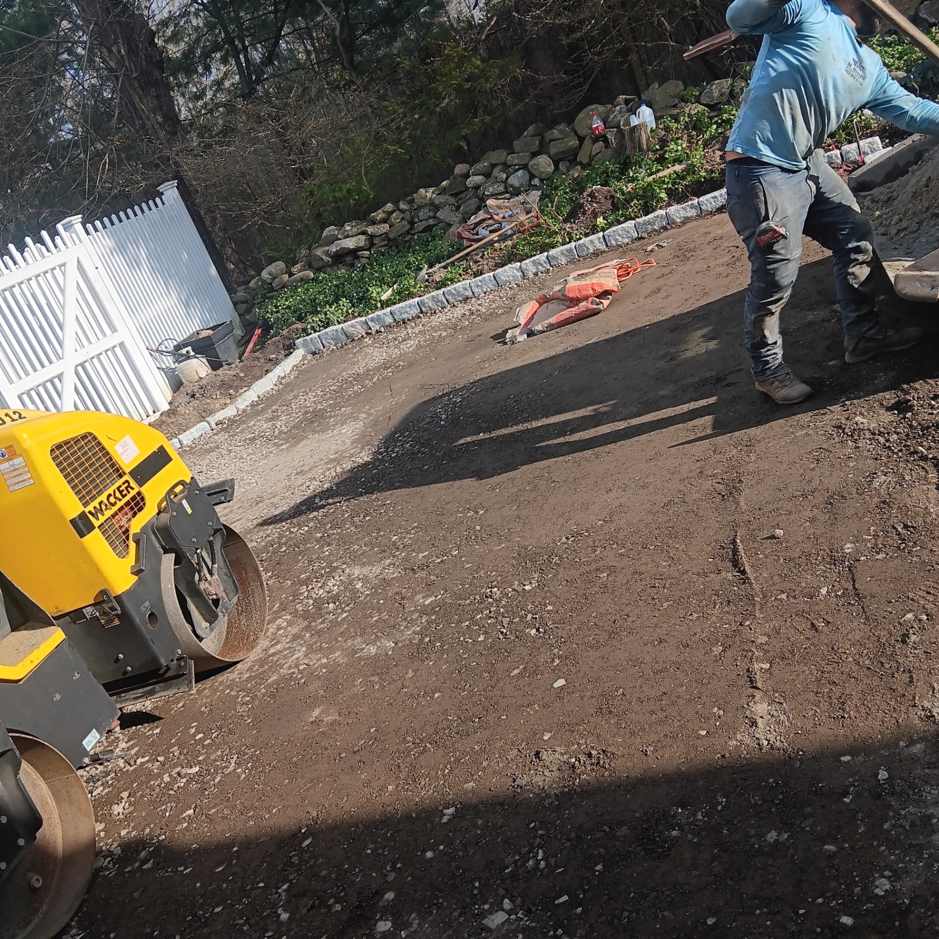 Base prep and compaction with roller equipment