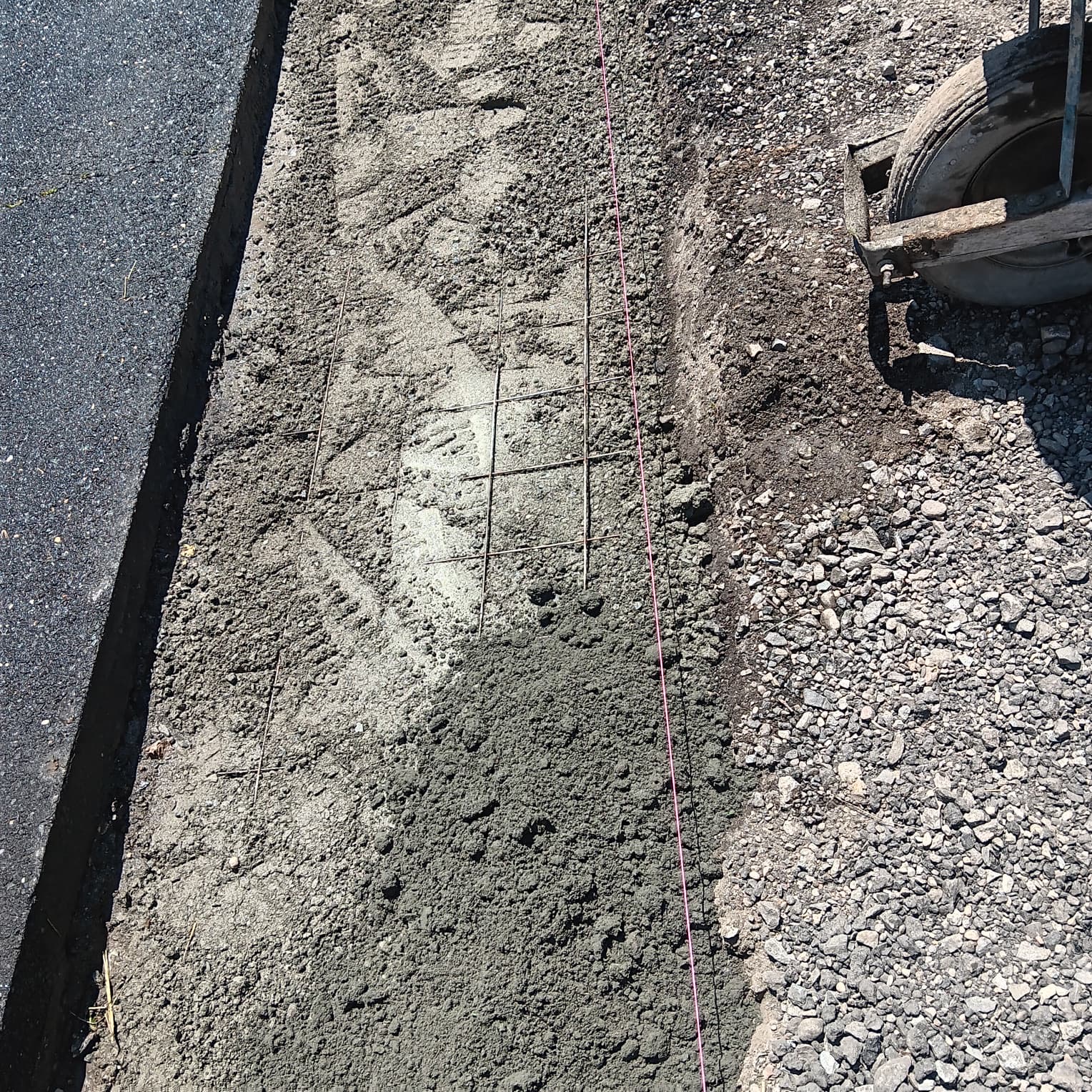 Concrete pad prep with rebar reinforcement